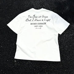 Unisex Vintage T Shirts Nirvana short-sleeve tee featuring a West Coast street-style graffiti and hip-hop aesthetic; crafted from heavyweight fabric with a distressed wash finish and direct-to-garment white ink printing.