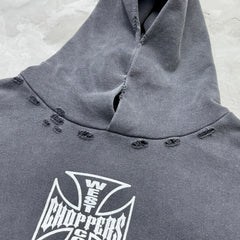 Unisex Vintage Hoodie Limited-edition distressed hooded sweatshirt featuring multi-zone handcrafted distressing details and a heavyweight fabric with an enzyme-washed, faded finish.