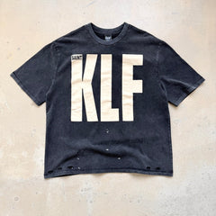 Unisex Vintage T Shirts Saint ¡Á KLF Freedom Radio Collaboration T-Shirt. Heavyweight 260g pure cotton fabric (post-wash weight). Vintage single-stitch and blind-stitch construction. Features hand-painted ink splatter, sandblasted wash finish, and dis