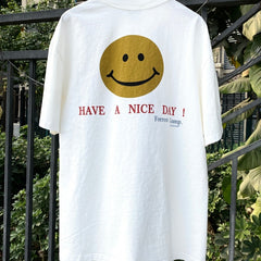 Unisex Vintage T Shirts Have a nice day! ¡ª Limited-edition smiley face design featuring direct-to-garment white ink printing; vintage style with a heavyweight, washed, and distressed finish.
