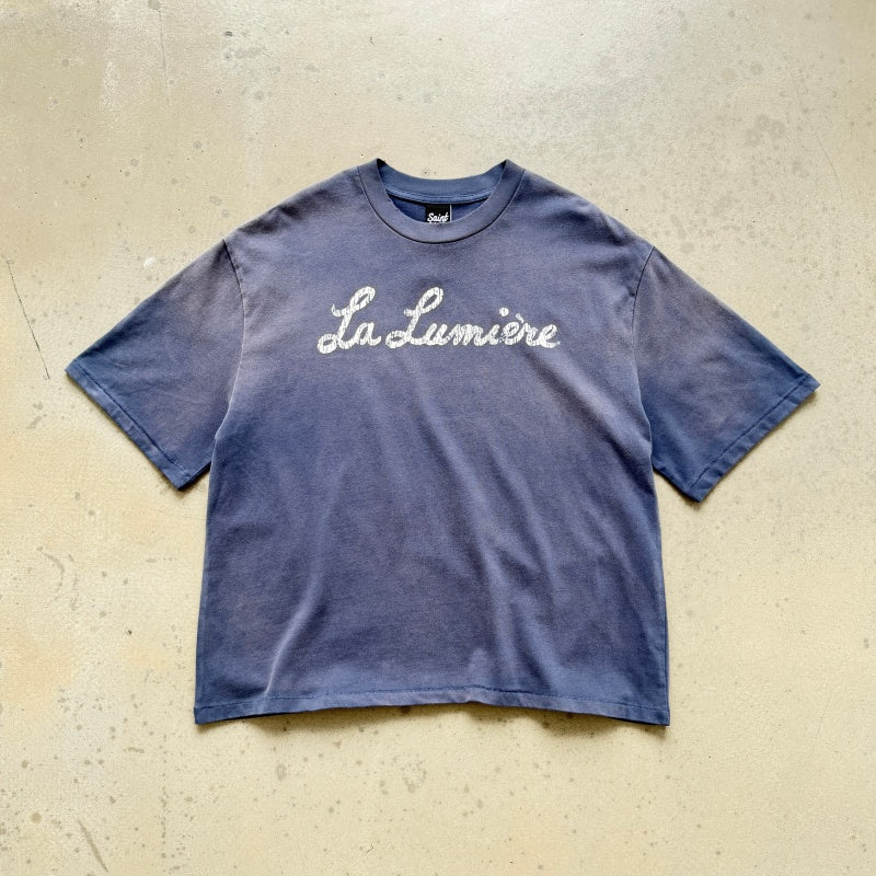 Unisex Vintage T Shirts SAINT MICHAEL La Lumi¨¨re (French for The Light) Limited Edition. Features heavyweight 320g fabric (post-wash weight) that matches the original specifications, along with vintage-style single-stitch and blind stitch (top-