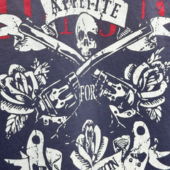 Unisex Vintage T Shirts Guns N' Roses x Harley-Davidson Limited Collaboration: Graphite Blue Short-Sleeve T-Shirt. Features a washed, distressed finish with whiskering effects and premium American-style plastisol screen printing. High-quality textu