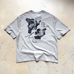 Unisex Vintage T Shirts SAINT MICHAEL x CHO Omnipotent Limited Edition ¨C High-Street Short-Sleeve Tee featuring Direct-to-Garment (DTG) white ink printing, heavy-duty distressed wash finish, and a unique cement-grey colorway.