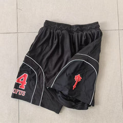 Trapstar shorts Embroidered number 24, casual beach style.